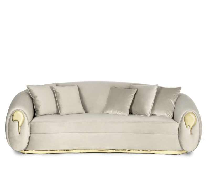 Luxury Living Room Sets - Sofa with gold details in both arms and a gold base in brass finish.