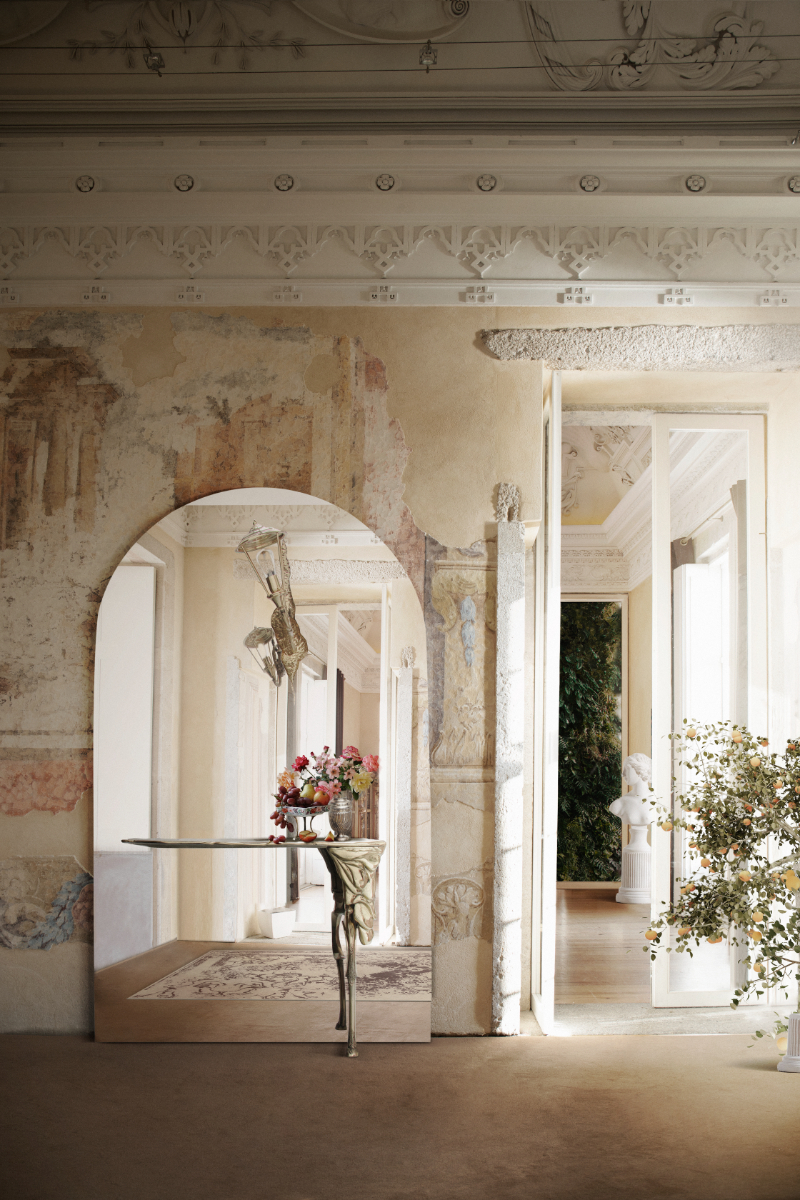 luxury entryway featuring collectible design pieces