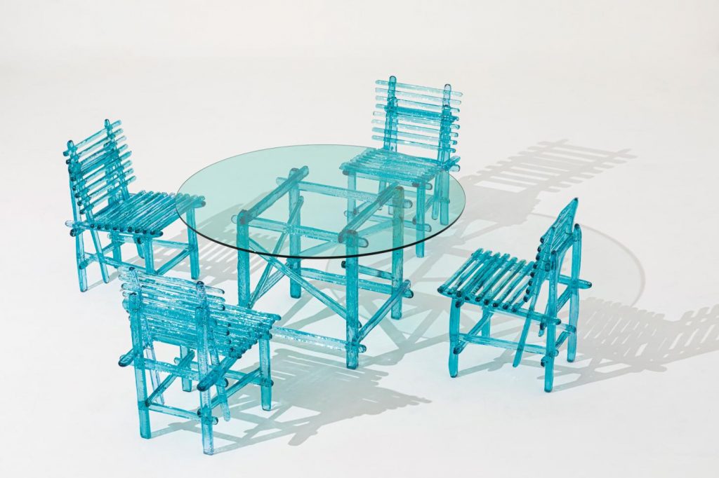 outdoor blue chairs and a blue dining table by Jacopo Foggini