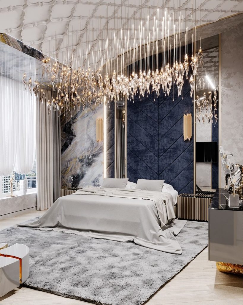 luxury bedroom with blue walls and a grey details