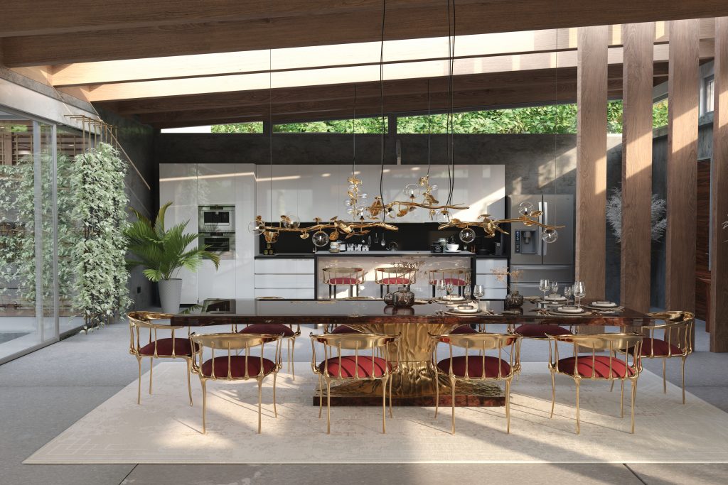luxury houses - luxury dining room with a wooden and gold dining table and golden chairs with burgundy seat